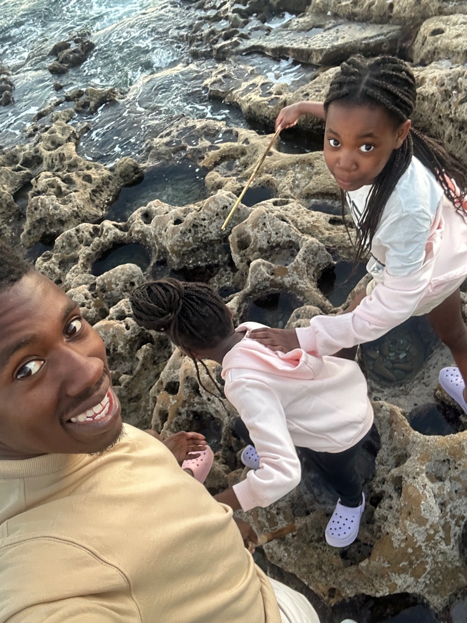 John and daughter at sunset