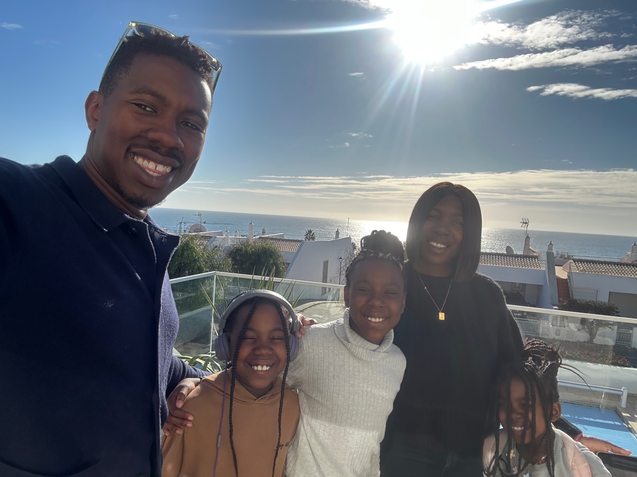 John with family by the ocean