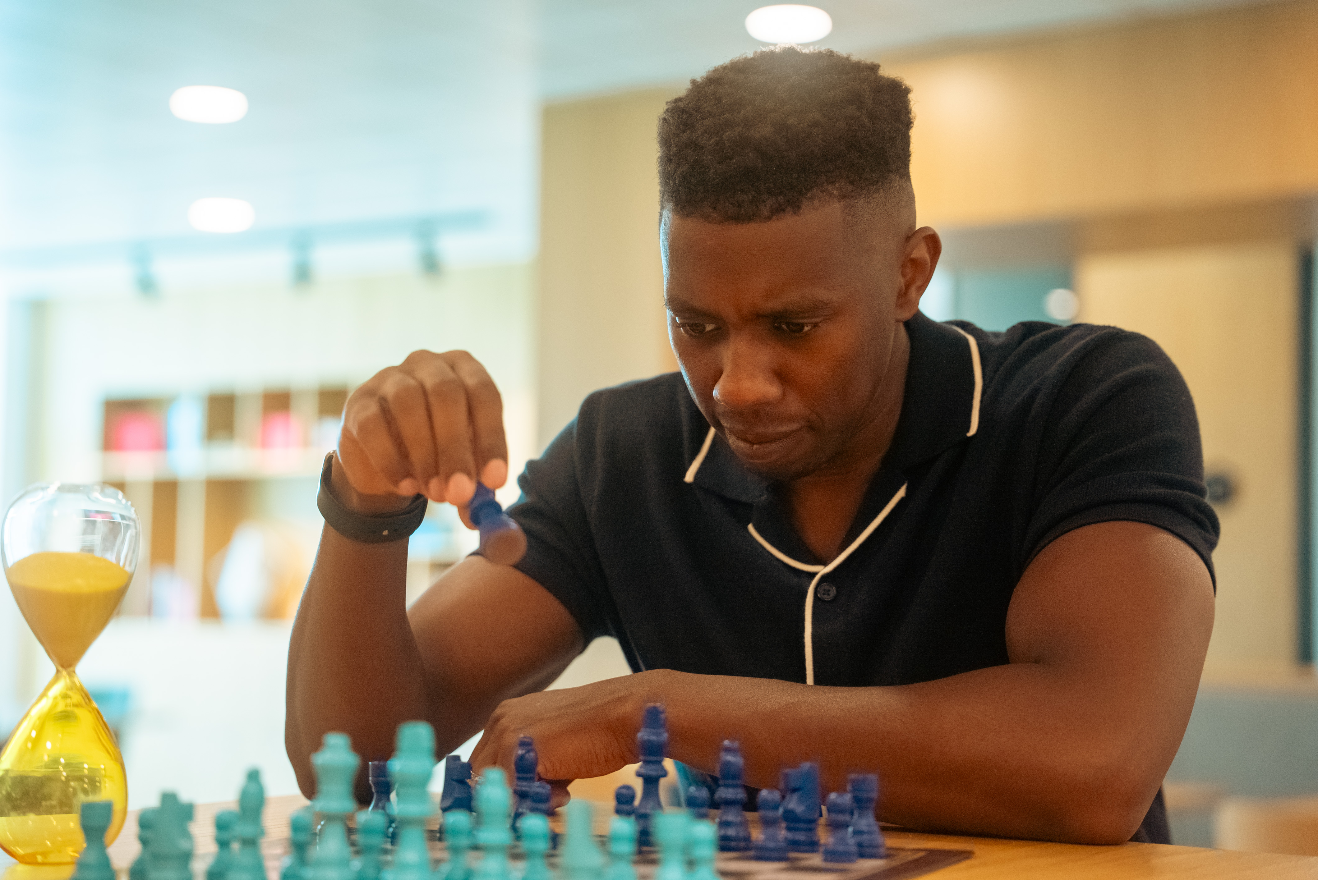 John playing chess — strategic thinking